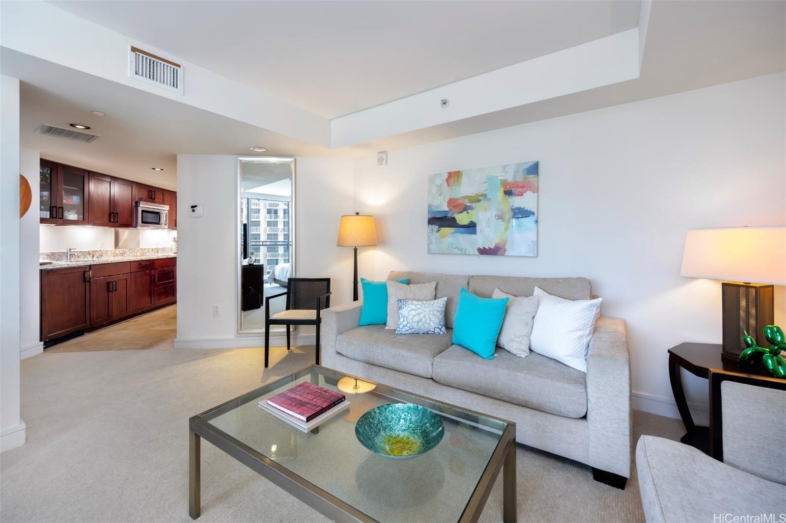 223 Saratoga Road, Unit 810 Honolulu, HI 96815 - Photo 7 of 24 a living room with furniture and a couch