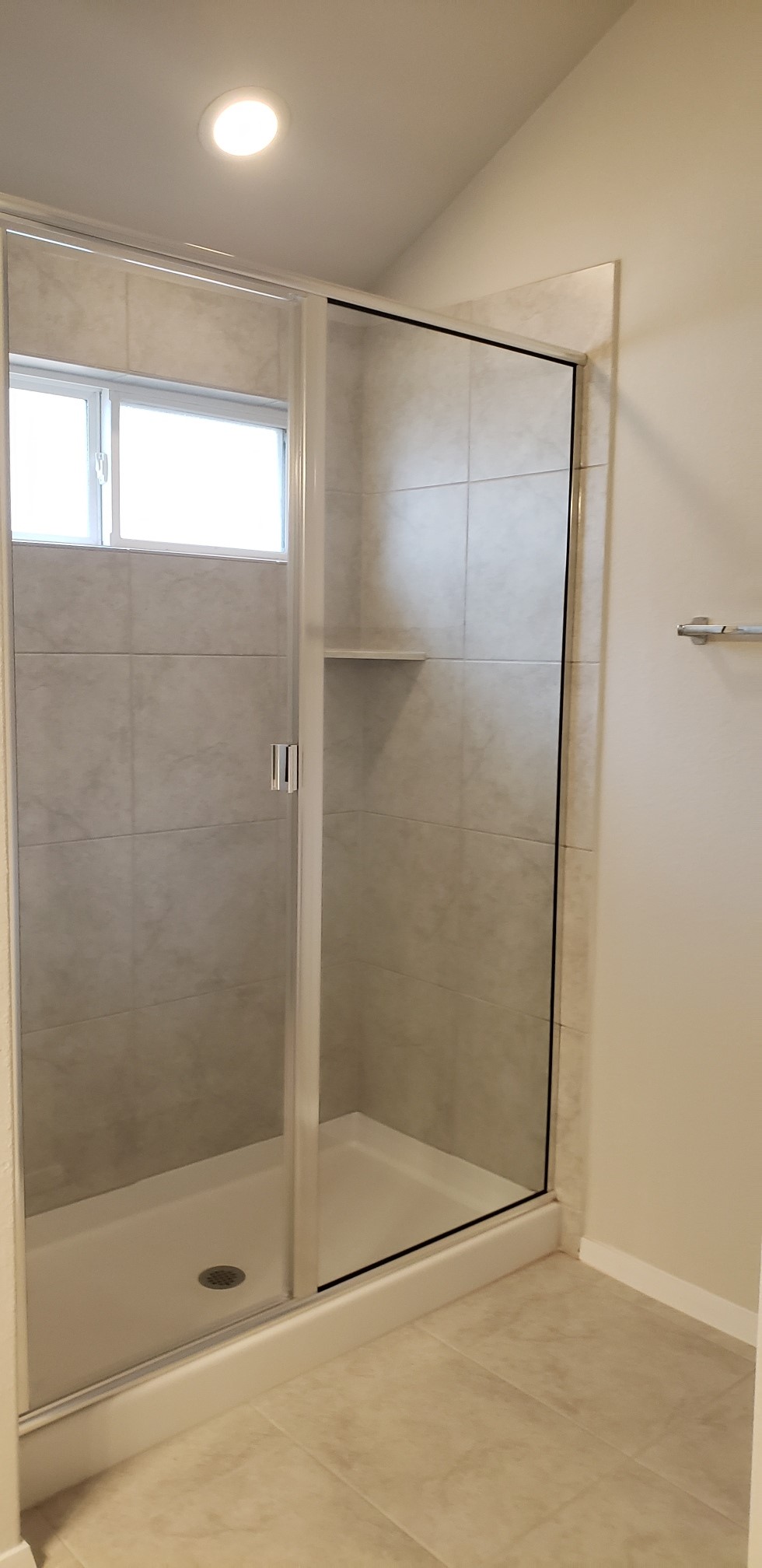 5612 Respinto Drive Austin, TX 78747 - Photo 16 of 23 a bathroom with a glass shower door