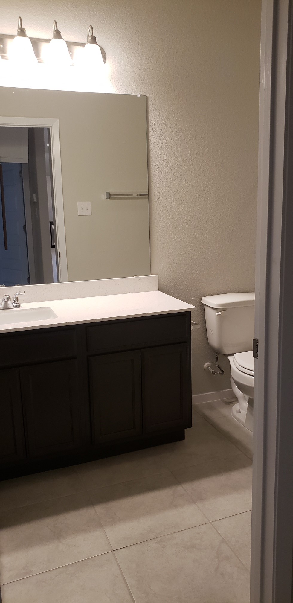 5612 Respinto Drive Austin, TX 78747 - Photo 19 of 23 a bathroom with a sink and a toilet