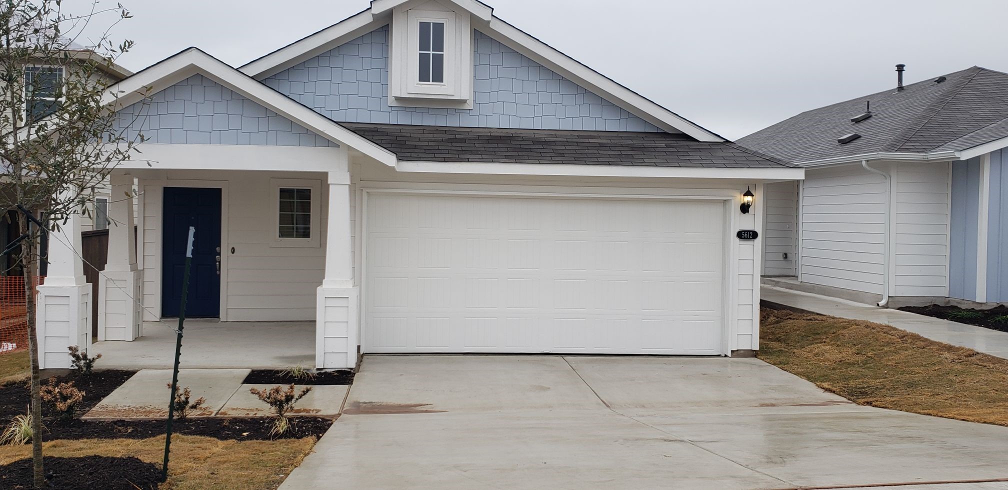 5612 Respinto Drive Austin, TX 78747 - Photo 2 of 23 a front view of a house with sitting area