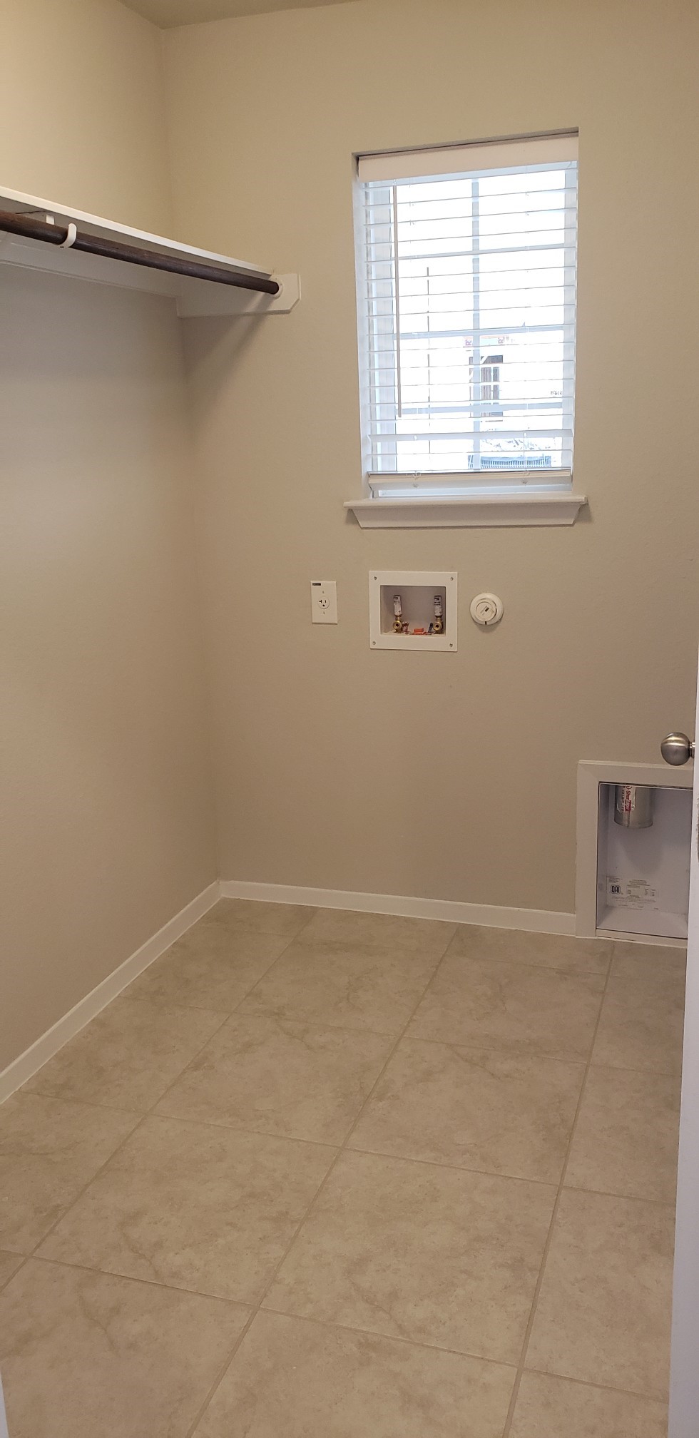 5612 Respinto Drive Austin, TX 78747 - Photo 6 of 23 a view of a room that has a window in it