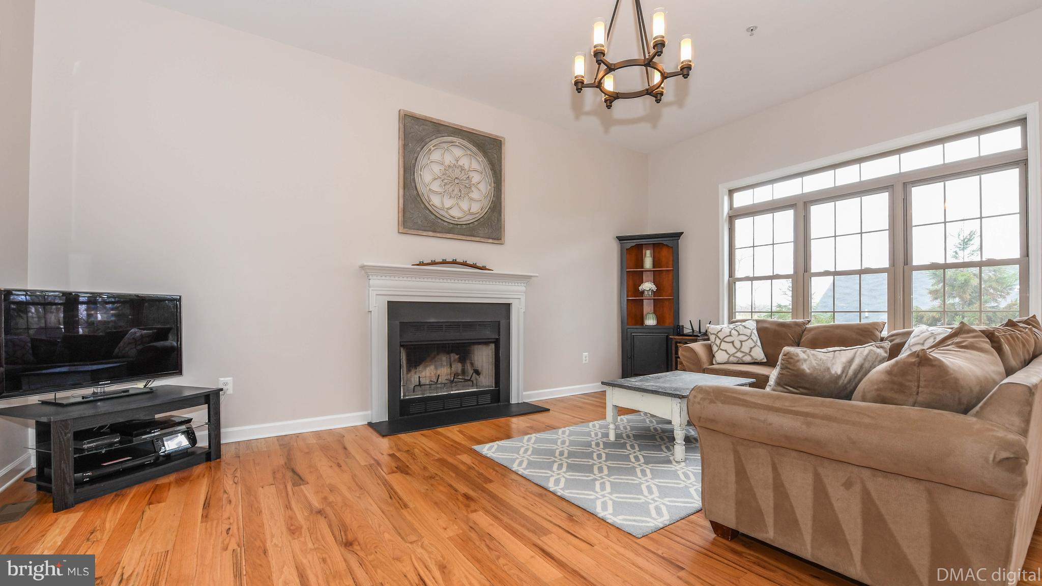 7162 Masters Road New Market, MD 21774 - Photo 8 of 30 Large Living room with Hardwood and fireplace