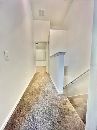 a view of a room with a hallway