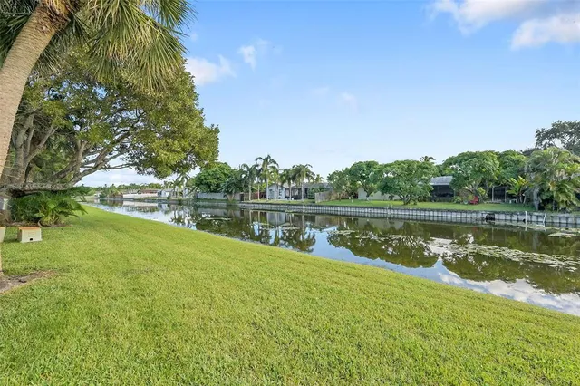 a view of lake with green space