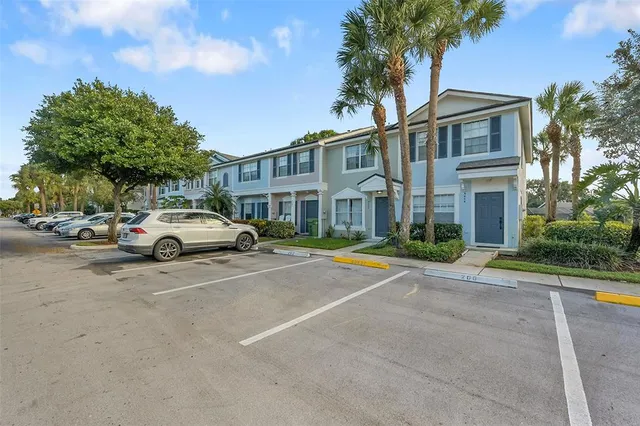 a view of a parked cars in front of a building