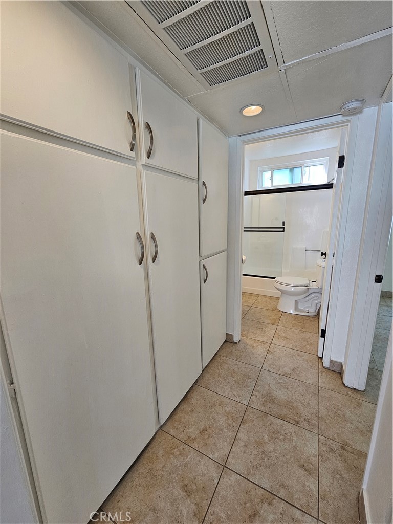 10037 Samoa Avenue, Unit 6 Tujunga, CA 91042 - Photo 3 of 7 a bathroom with a shower and toilet