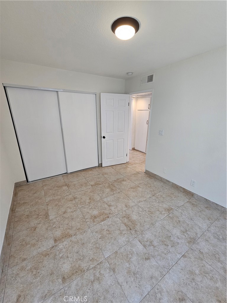 10037 Samoa Avenue, Unit 6 Tujunga, CA 91042 - Photo 5 of 7 a view of an empty room and entryway