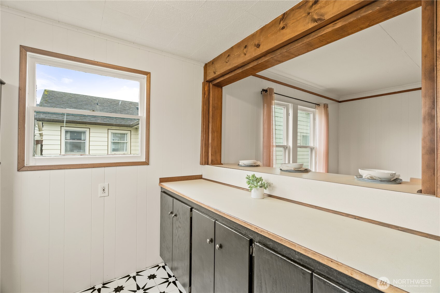 515 5th Street Hoquiam, WA 98550 - Photo 13 of 34 a bathroom with a sink and a mirror