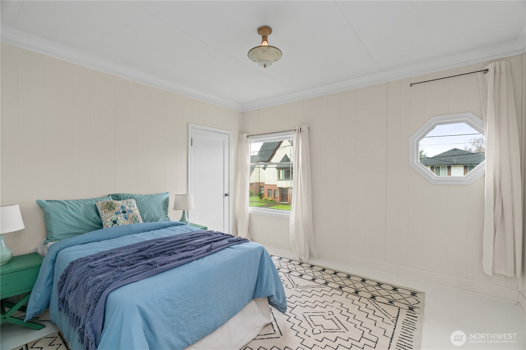 515 5th Street Hoquiam, WA 98550 - Photo 20 of 34 a bedroom with a bed and a window