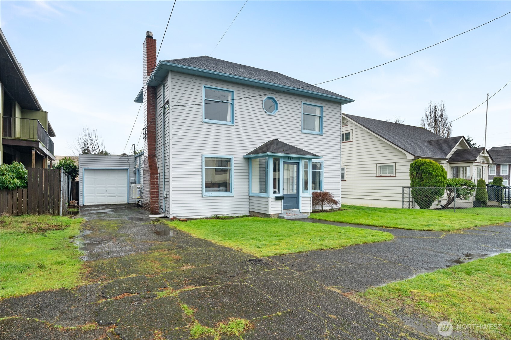 515 5th Street Hoquiam, WA 98550 - Photo 2 of 34 a view of a house with a yard