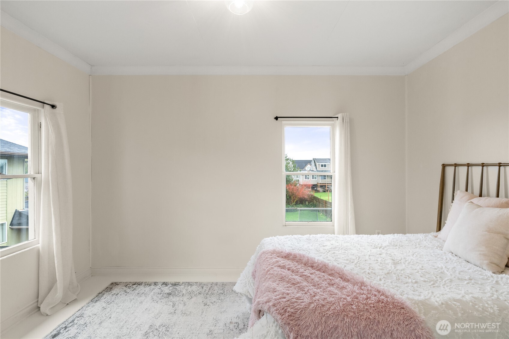 515 5th Street Hoquiam, WA 98550 - Photo 28 of 34 a bedroom with a bed and a window