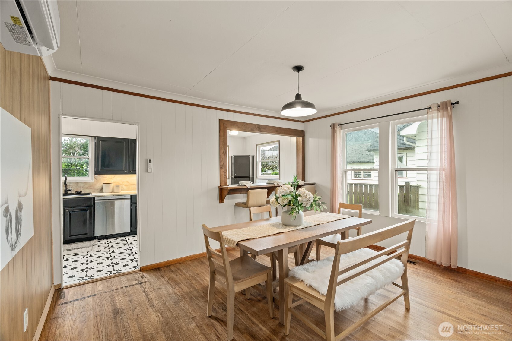515 5th Street Hoquiam, WA 98550 - Photo 8 of 34 a view of a dining room with furniture window and wooden floor