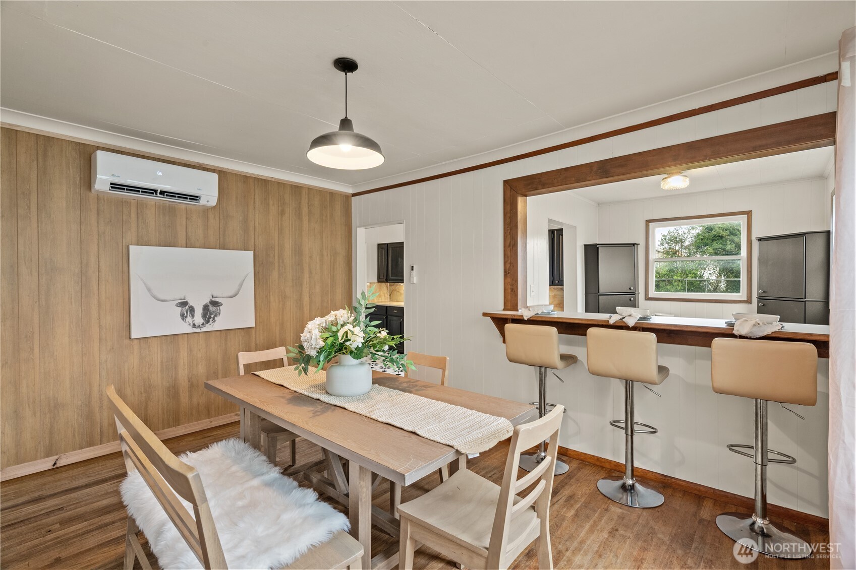 515 5th Street Hoquiam, WA 98550 - Photo 9 of 34 a view of a dining room with furniture and a large window