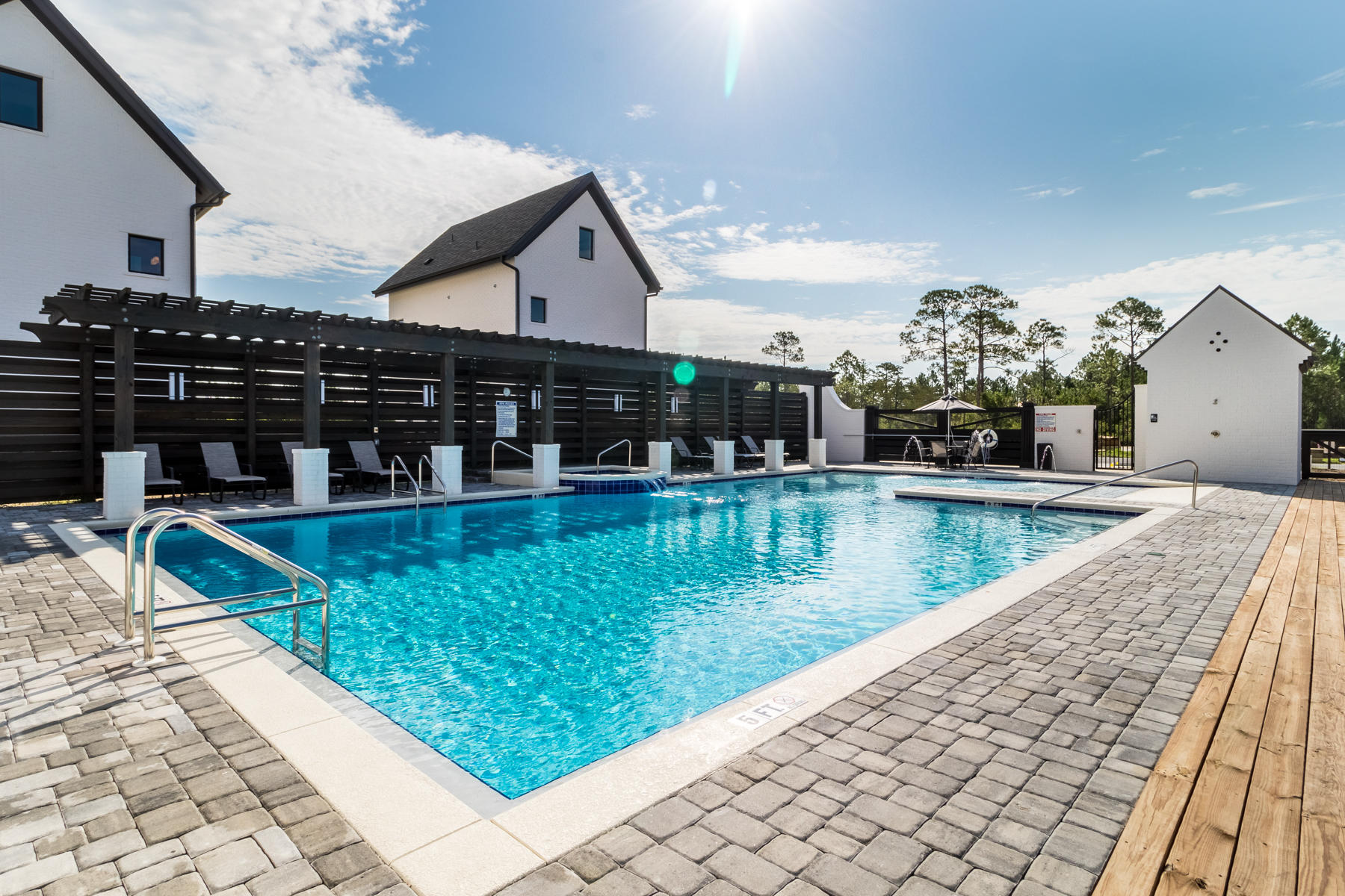 285 Ridgewalk Circle Santa Rosa Beach, FL 32459 - Photo 16 of 33 a view of a swimming pool with a patio