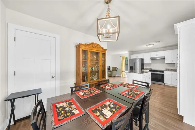 a view of a dining room with furniture