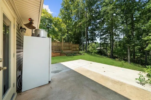 a backyard of a house with lots of green space
