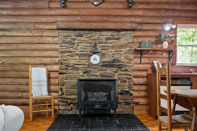 a picture of a fireplace with a wooden floor