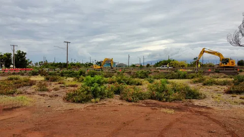 a backyard of a house with a yard and outdoor seating