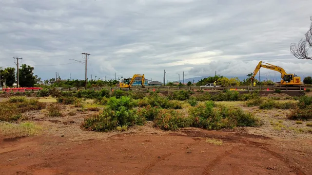 a backyard of a house with a yard and outdoor seating