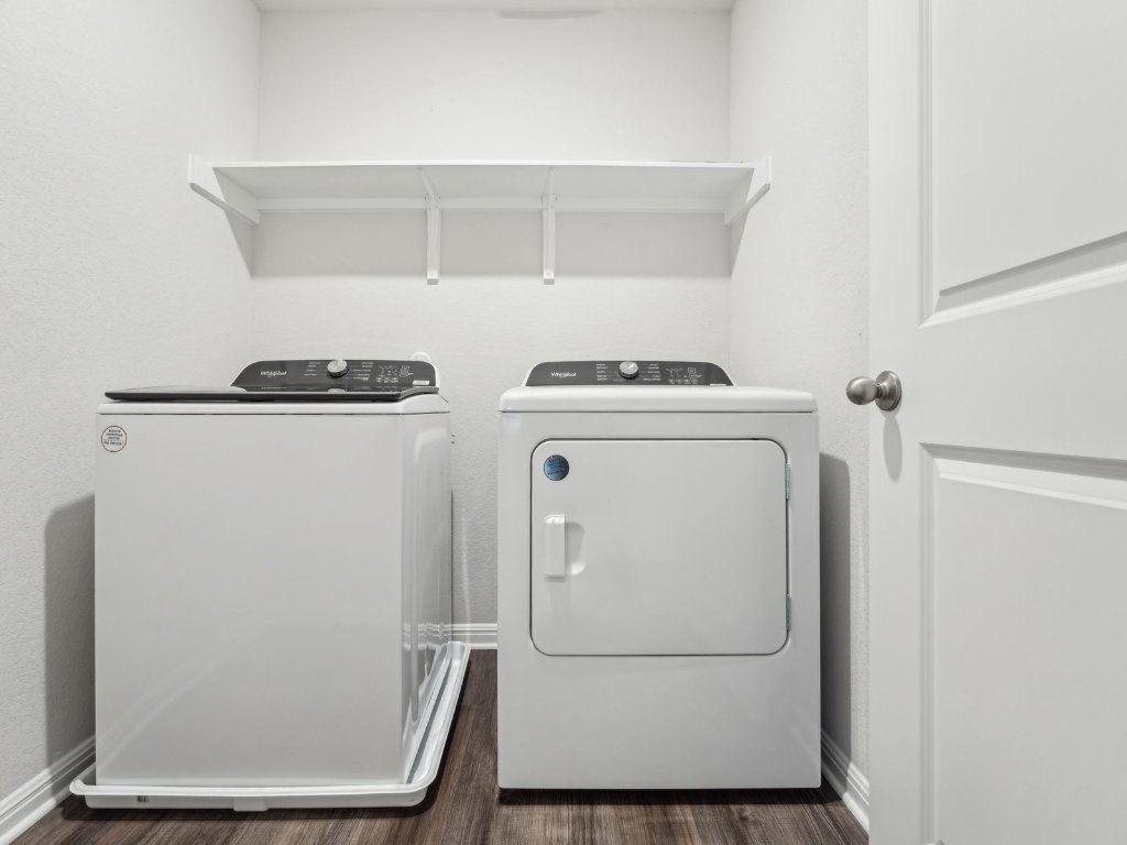 165 Calcite Road, Unit 2 Kyle, TX 78640 - Photo 12 of 14 a utility room with dryer and washer