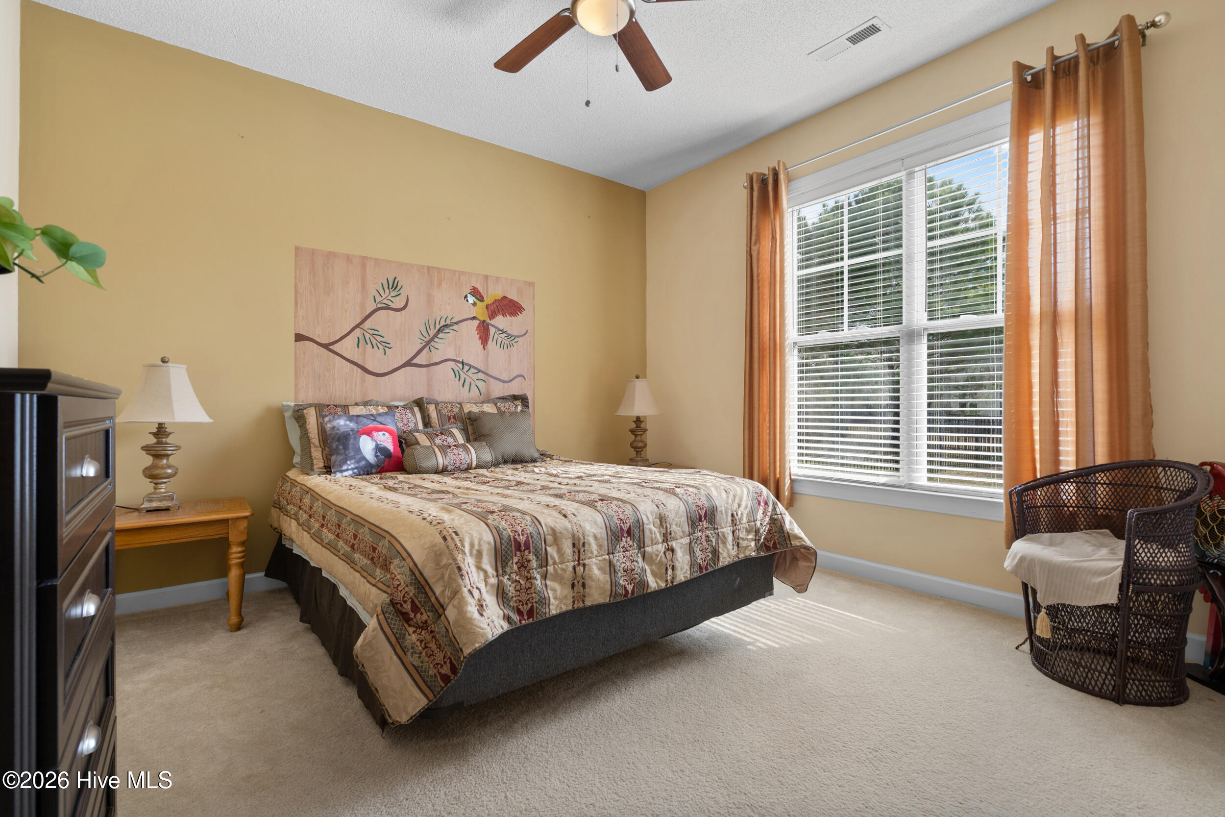 1013 Meadowlands Trail Calabash, NC 28467 - Photo 22 of 41 Overnight guests can choose from two beautiful bedrooms on the main level, each with a full bathroom.