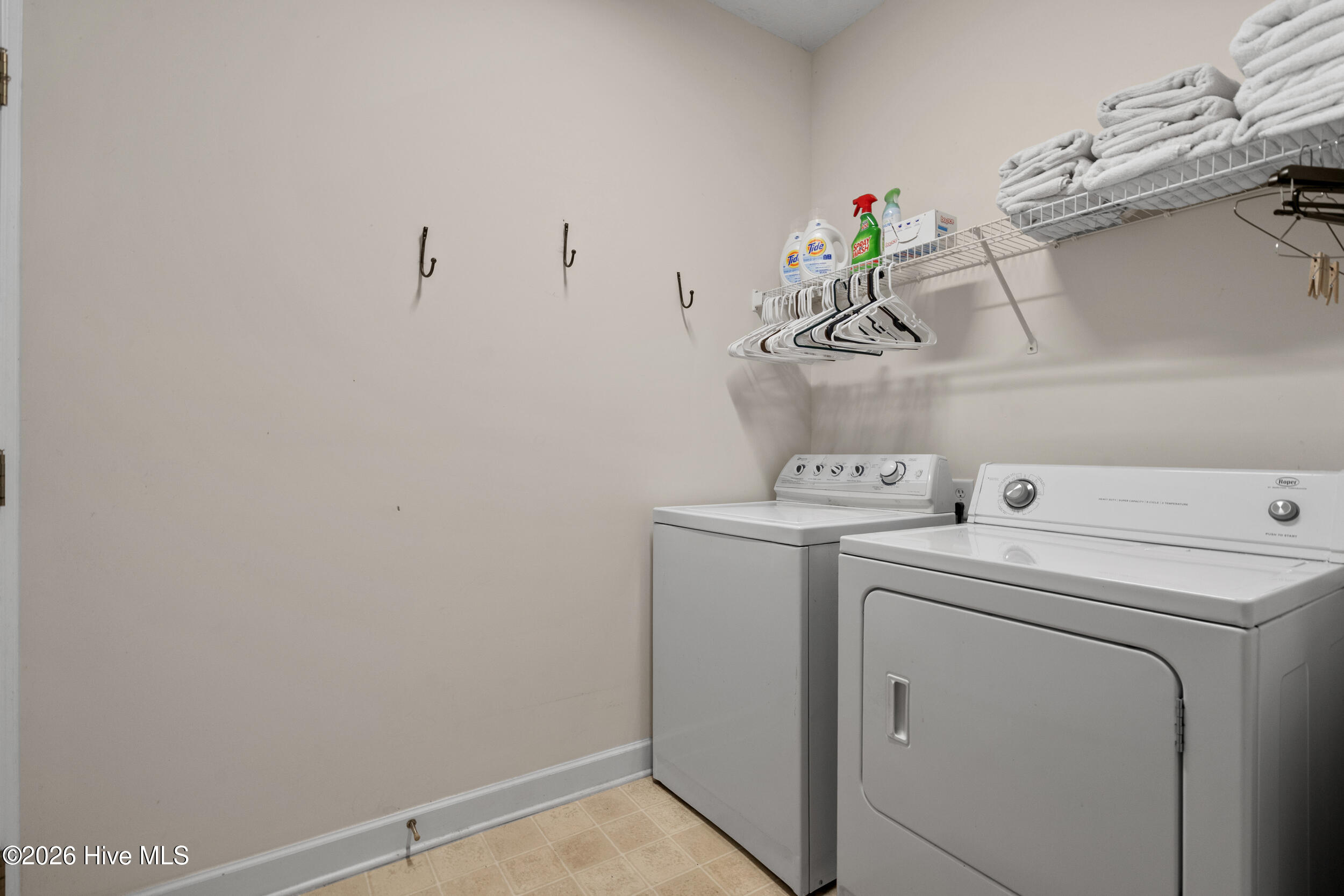1013 Meadowlands Trail Calabash, NC 28467 - Photo 25 of 41 Easy access to the two-car garage from the laundry room right off the kitchen. The washer and the dryer will convey.