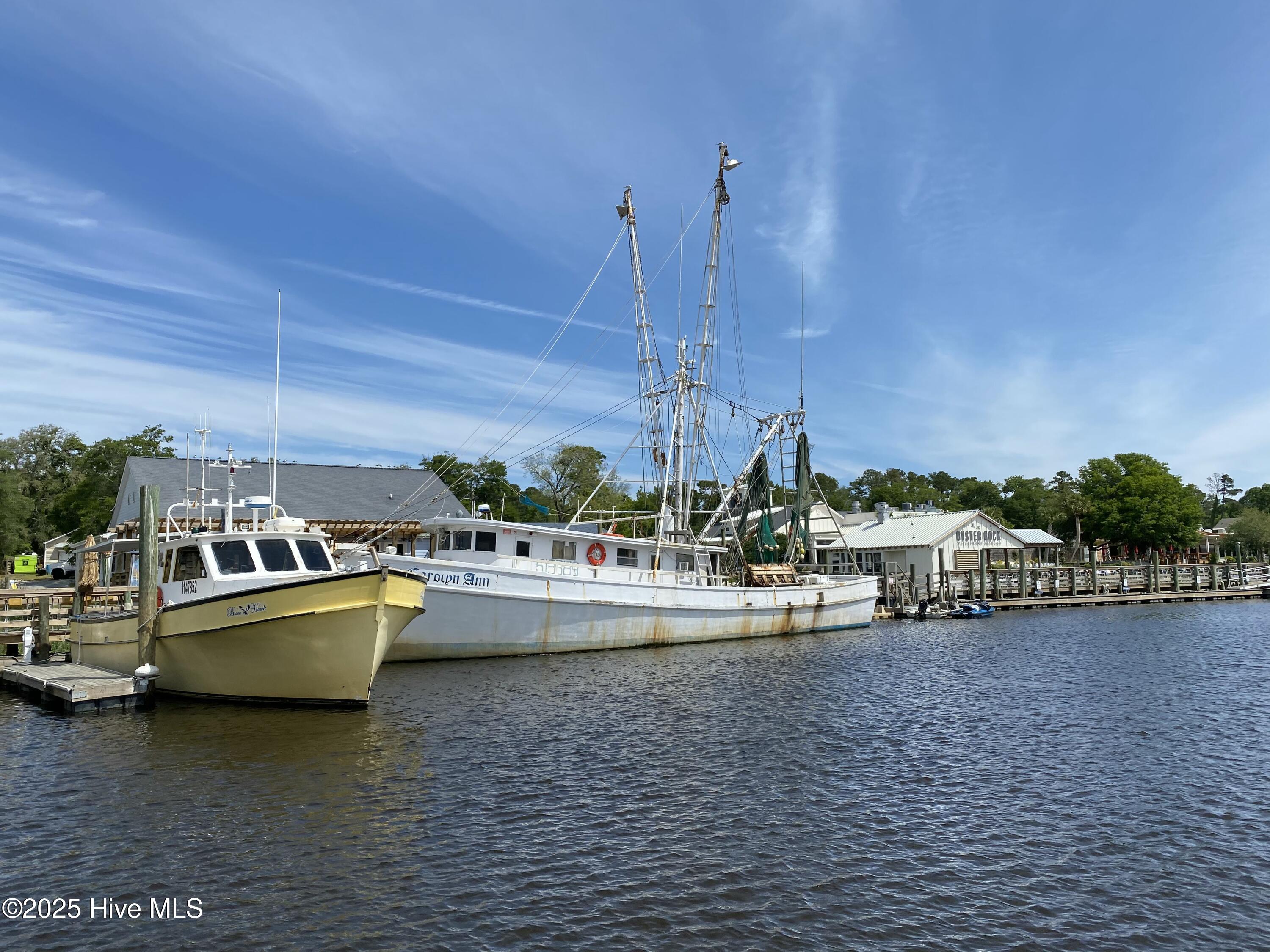 1013 Meadowlands Trail Calabash, NC 28467 - Photo 38 of 41 Calabash Riverfront is a scenic and charming area located in Calabash, North Carolina. Known for its picturesque waterfront views and famous seafood restaurants, the Calabash Riverfront offers visitors a relaxing coastal experience. The river itself winds through the town, providing a habitat for local wildlife and a peaceful setting for boating and fishing.