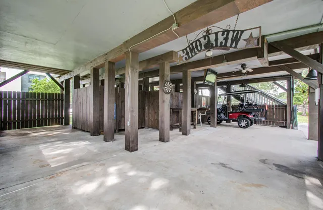 a view of parking garage with cars
