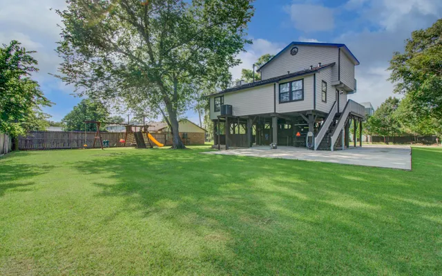 a view of a house with a park