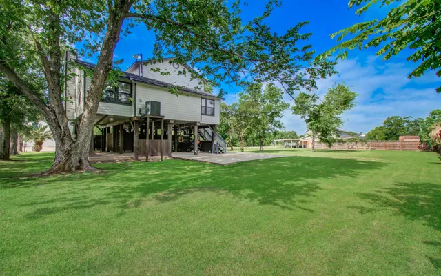 a view of a house with a park