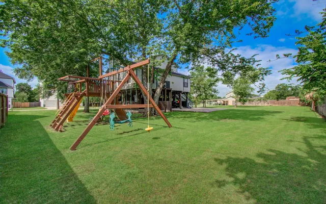 a view of a house with a big yard