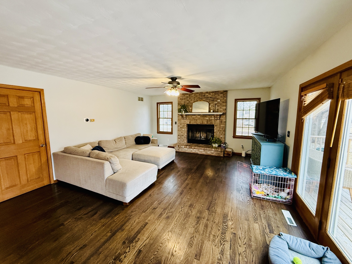 10151 East Hickory Ridge Drive Rochelle, IL 61068 - Photo 12 of 31 a living room with furniture and a fireplace