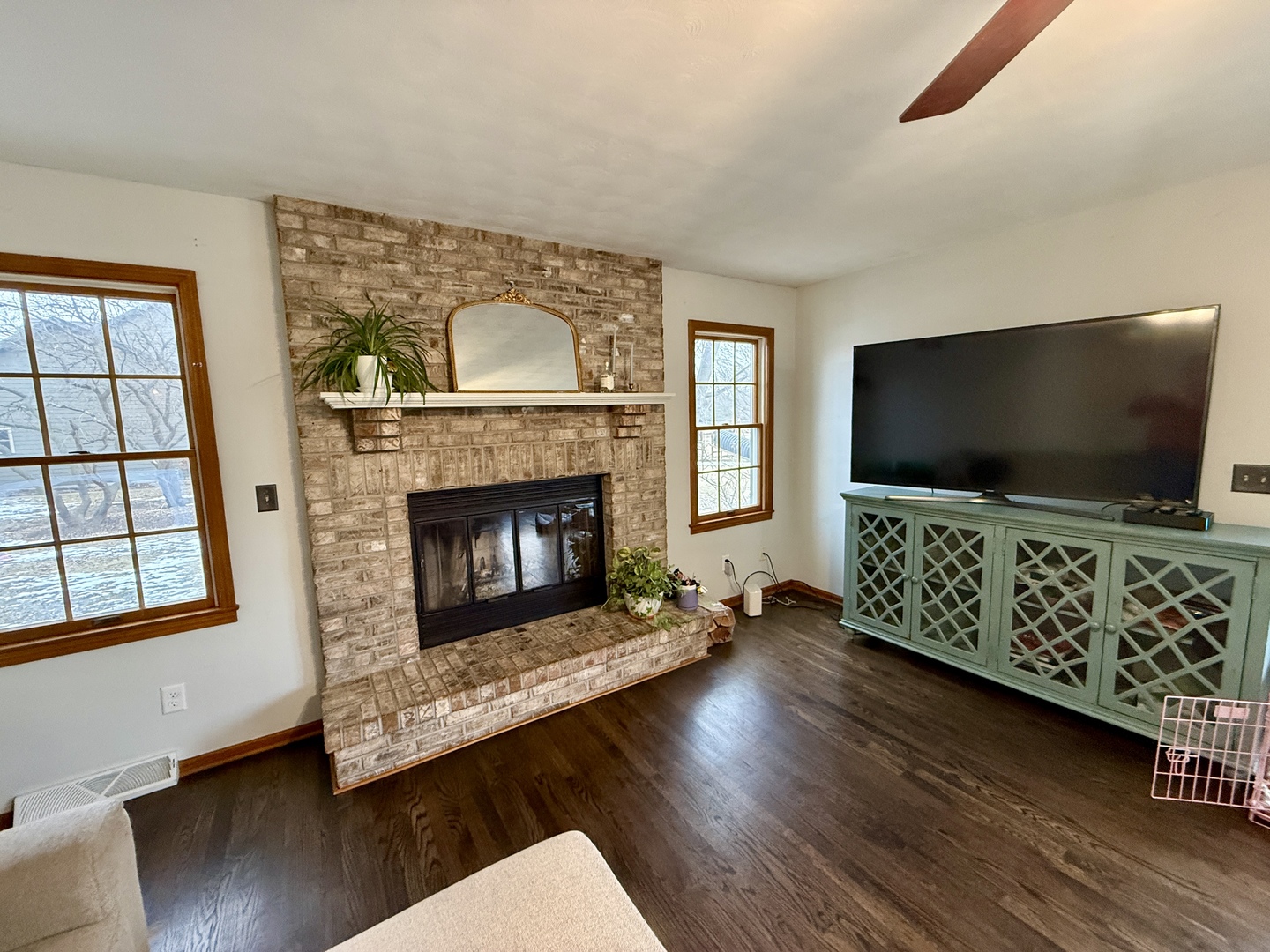 10151 East Hickory Ridge Drive Rochelle, IL 61068 - Photo 13 of 31 a living room with furniture and a flat screen tv
