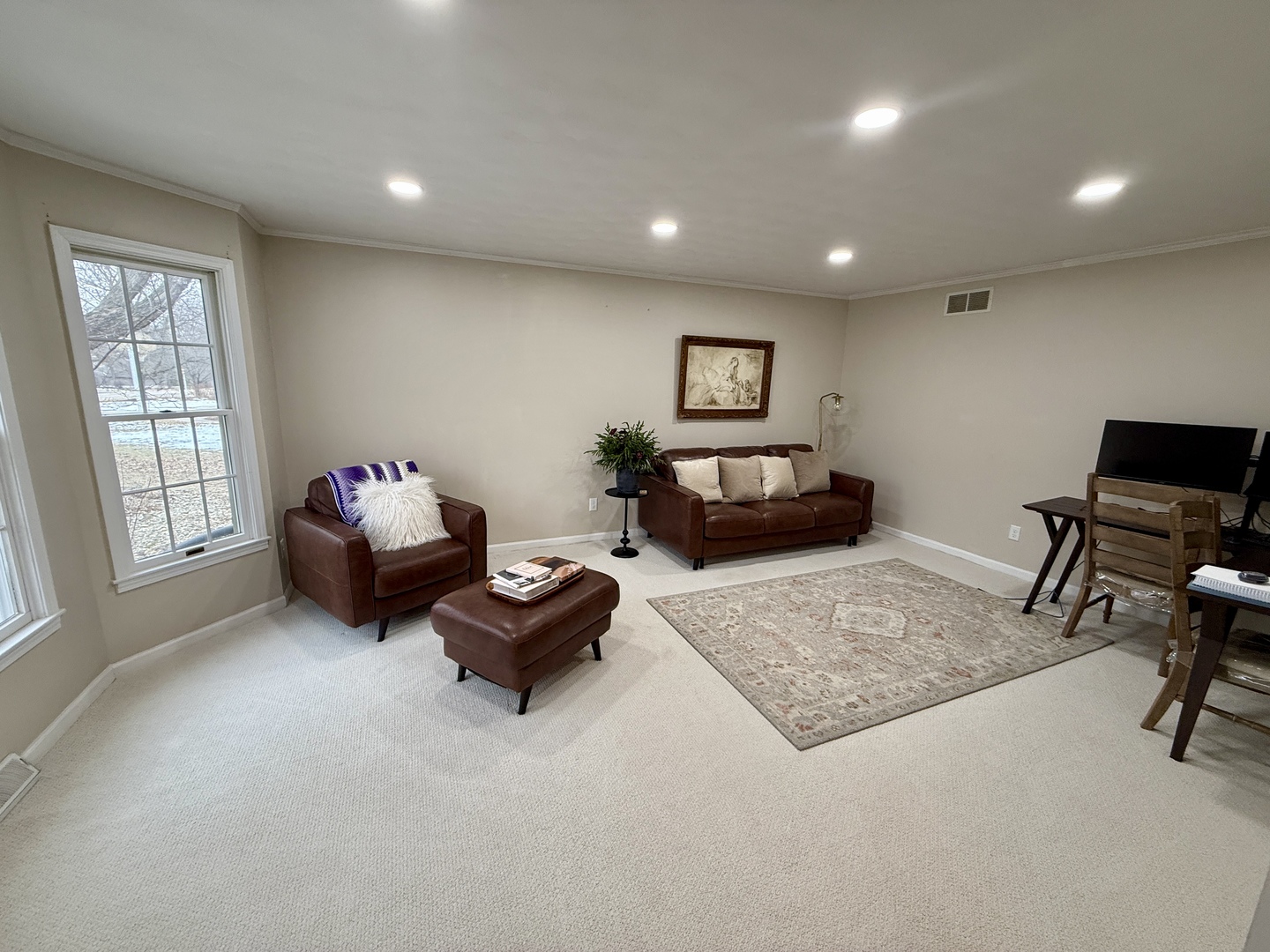 10151 East Hickory Ridge Drive Rochelle, IL 61068 - Photo 2 of 31 a living room with furniture and a window