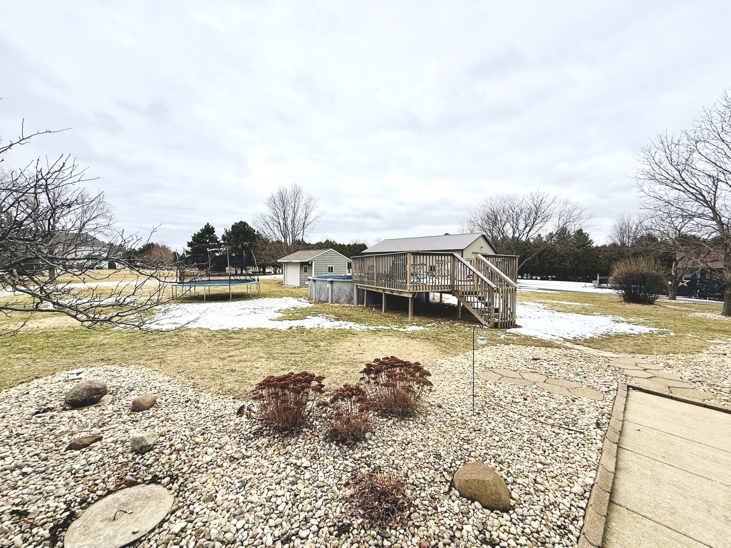 10151 East Hickory Ridge Drive Rochelle, IL 61068 - Photo 29 of 31 a view of a swimming pool with a yard