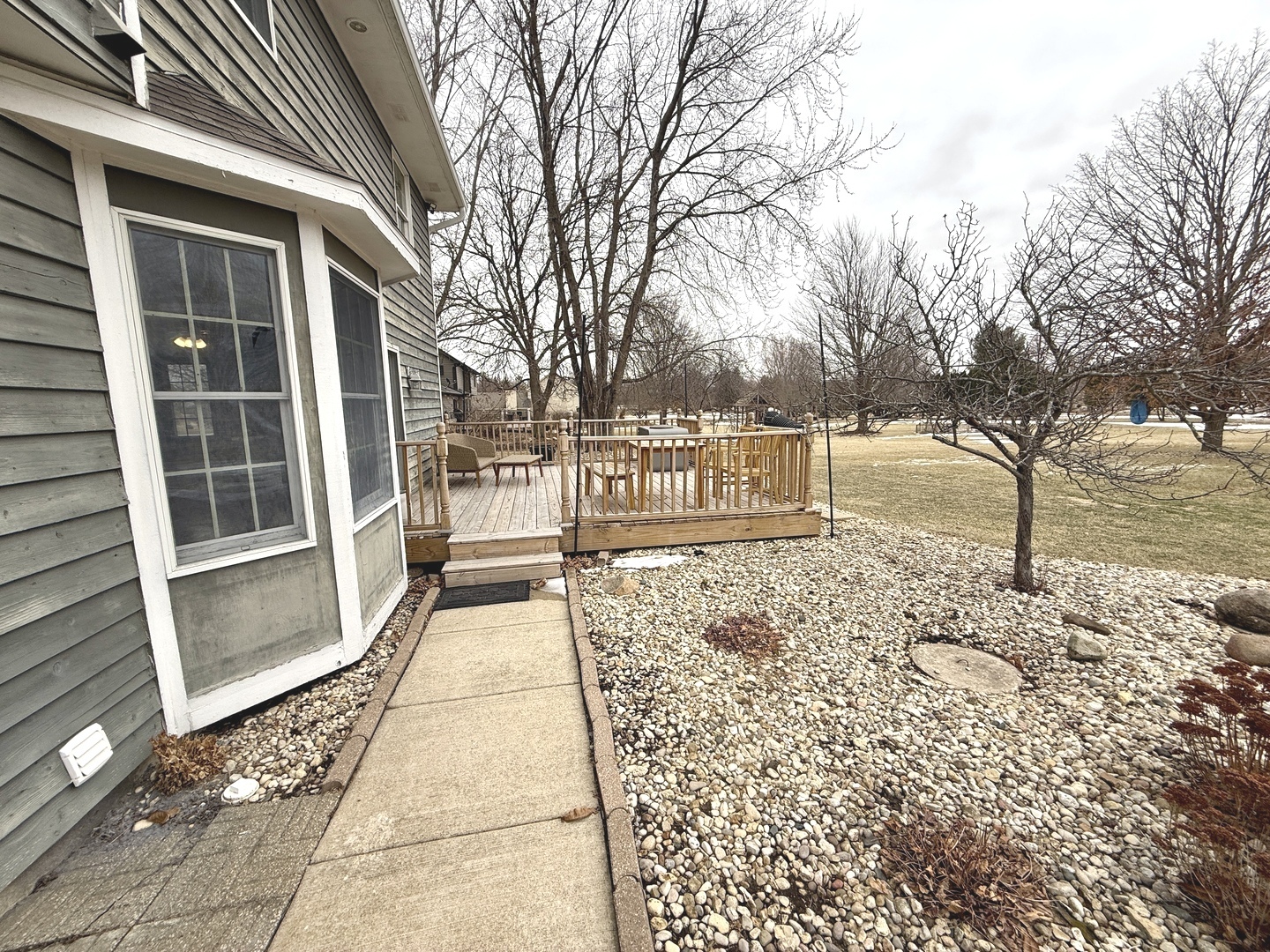 10151 East Hickory Ridge Drive Rochelle, IL 61068 - Photo 30 of 31 a view of a pathway and a house with a yard