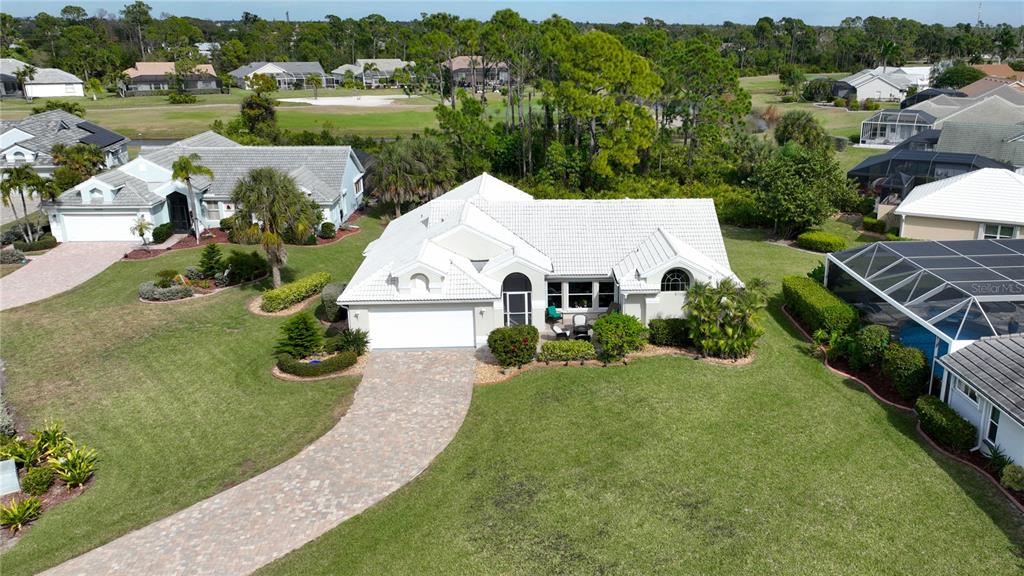 5010 Sable Key Circle Punta Gorda, FL 33955 - Photo 2 of 41 an aerial view of a house with garden space and street view