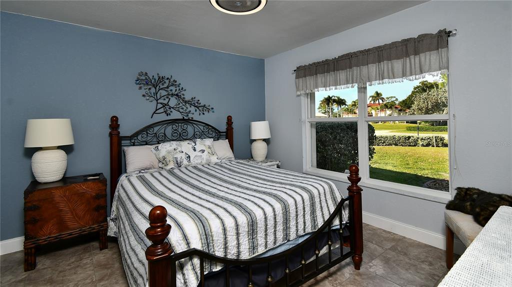 5010 Sable Key Circle Punta Gorda, FL 33955 - Photo 31 of 41 a bedroom with a bed and window