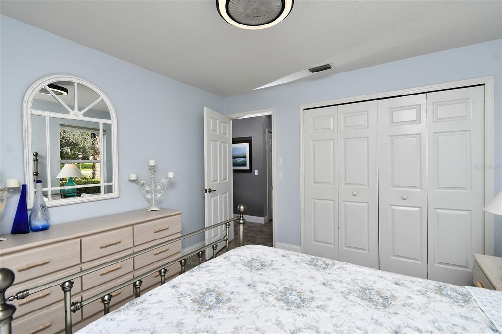 5010 Sable Key Circle Punta Gorda, FL 33955 - Photo 34 of 41 a bedroom with a bed and a dresser