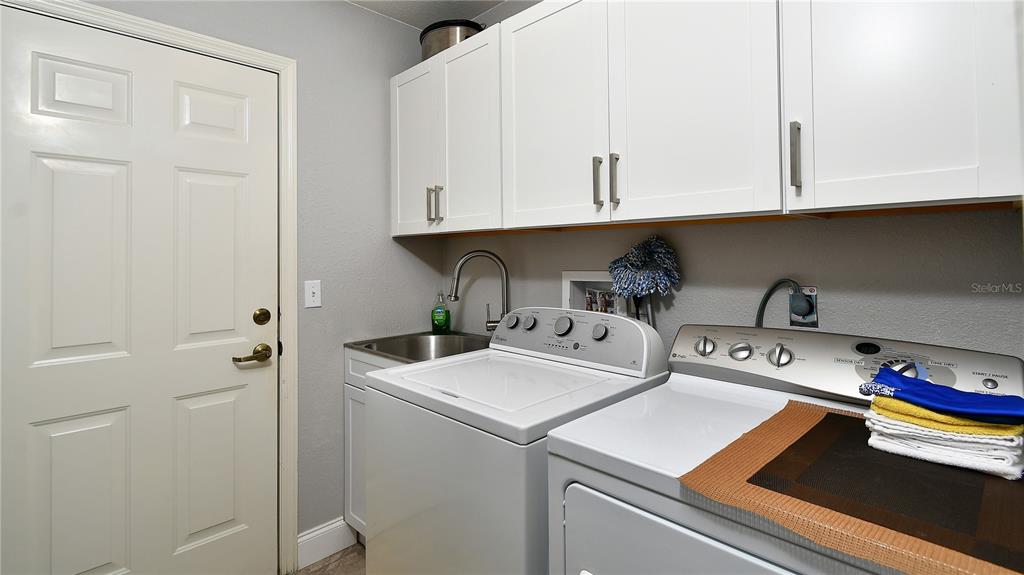 5010 Sable Key Circle Punta Gorda, FL 33955 - Photo 38 of 41 a utility room with dryer and washer