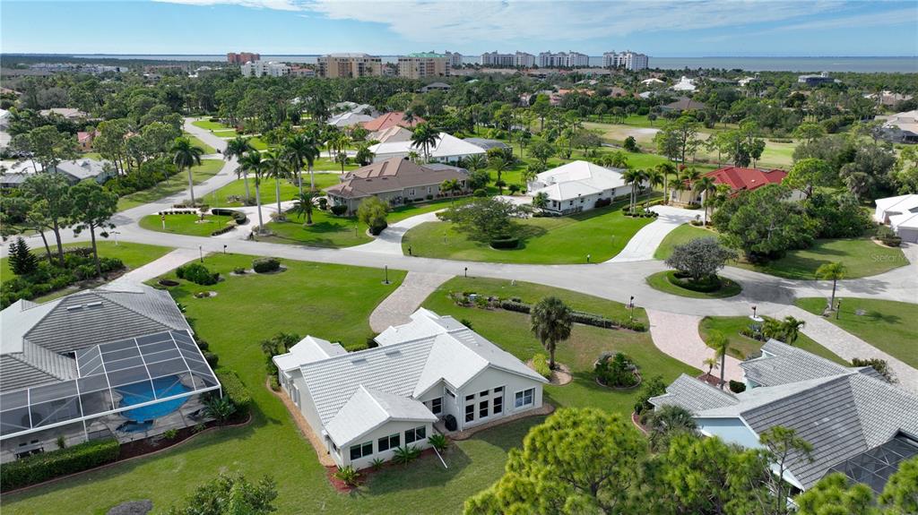 5010 Sable Key Circle Punta Gorda, FL 33955 - Photo 4 of 41 an aerial view of a house with a garden and mountain view in back