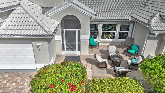 a front view of a house with seating space