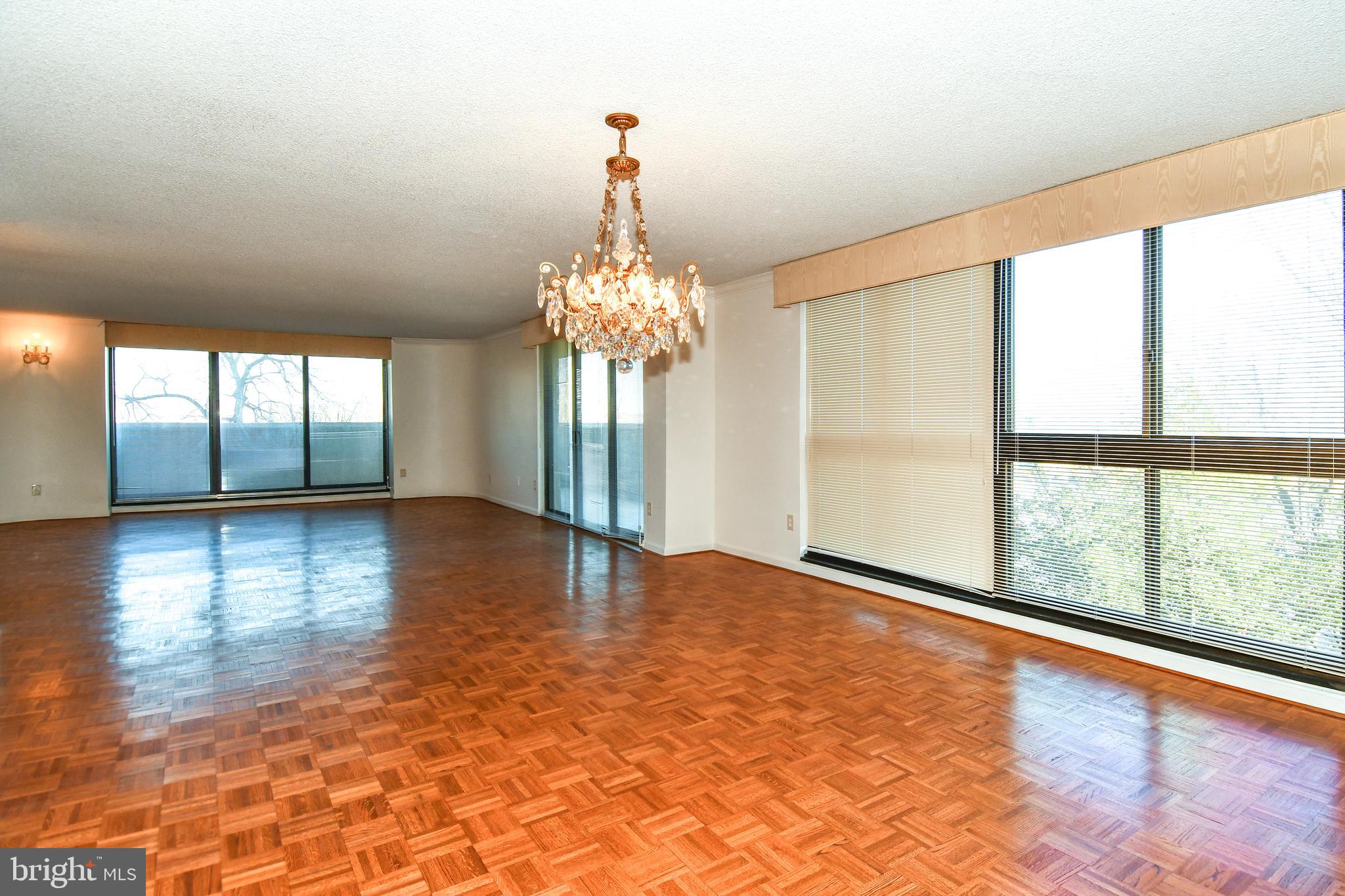 1101 South Arlington Ridge Road, Unit 316 Arlington, VA 22202 - Photo 18 of 75 a view of a room with large windows