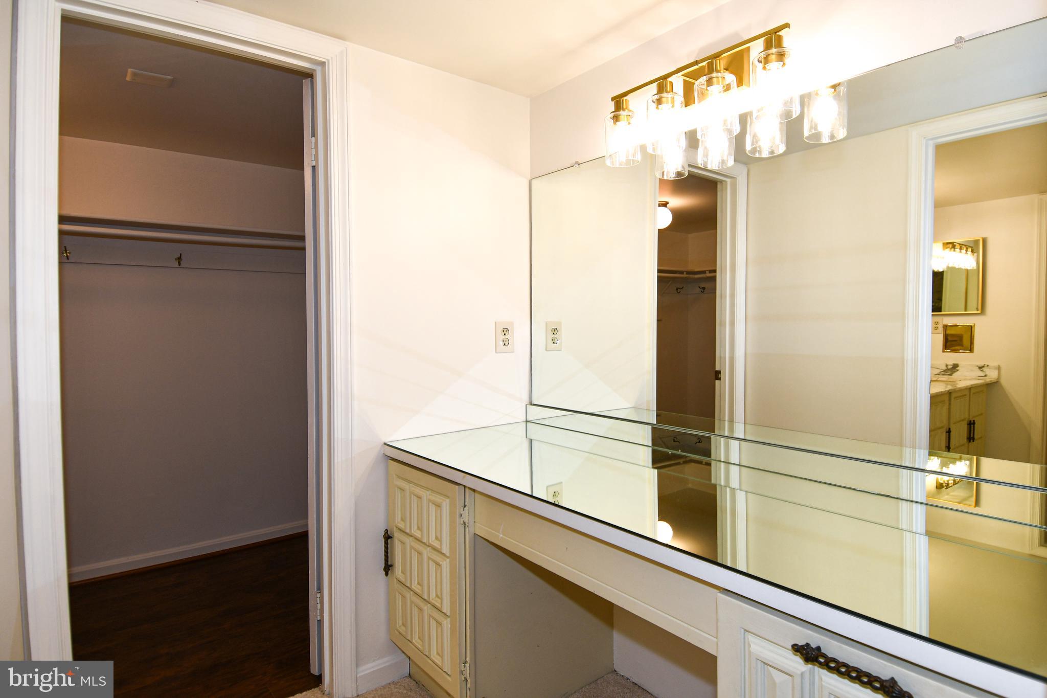 1101 South Arlington Ridge Road, Unit 316 Arlington, VA 22202 - Photo 35 of 75 a bathroom with a shower and a sink