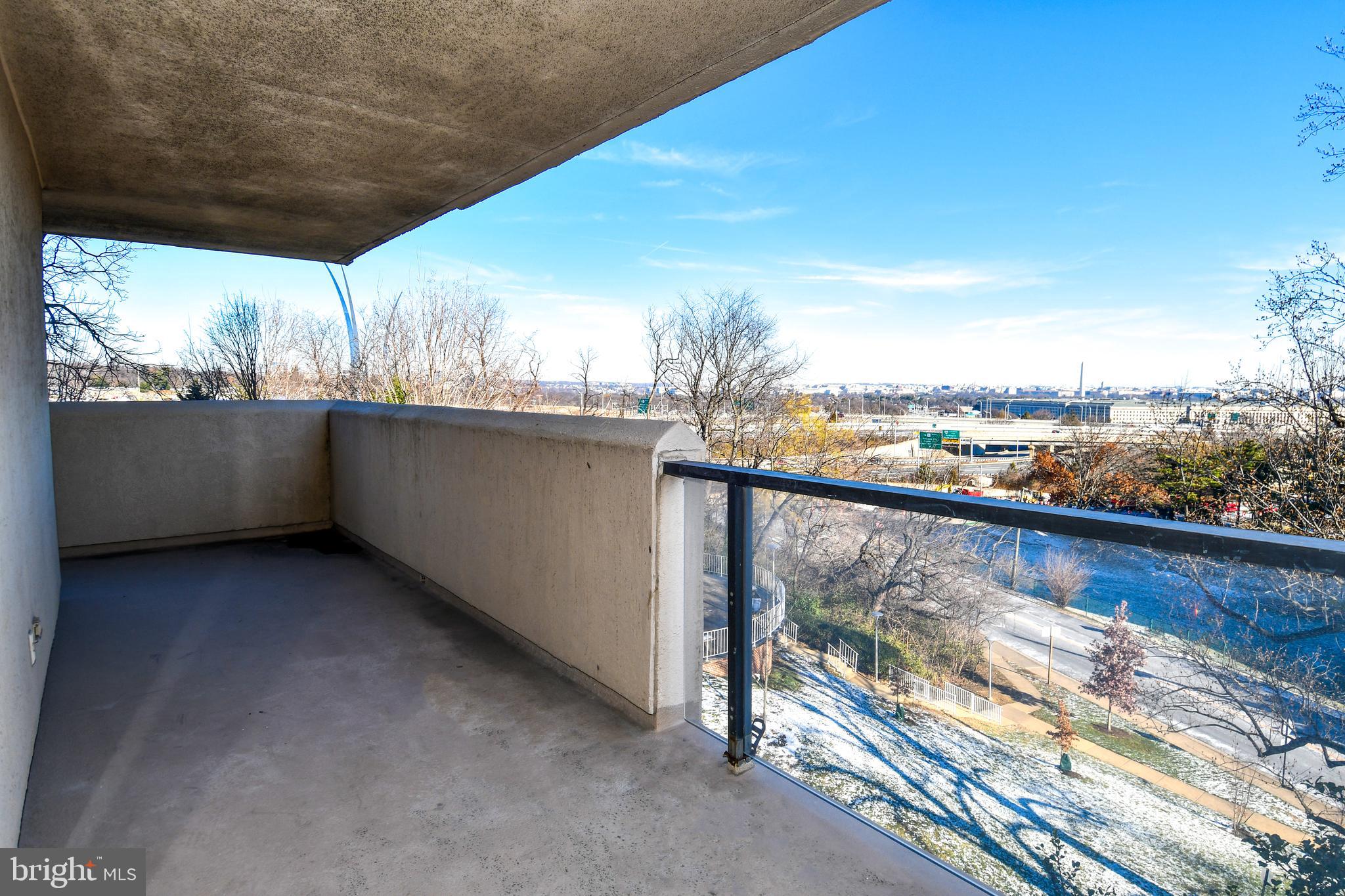 1101 South Arlington Ridge Road, Unit 316 Arlington, VA 22202 - Photo 52 of 75 Wrap around balcony with view of D.C.