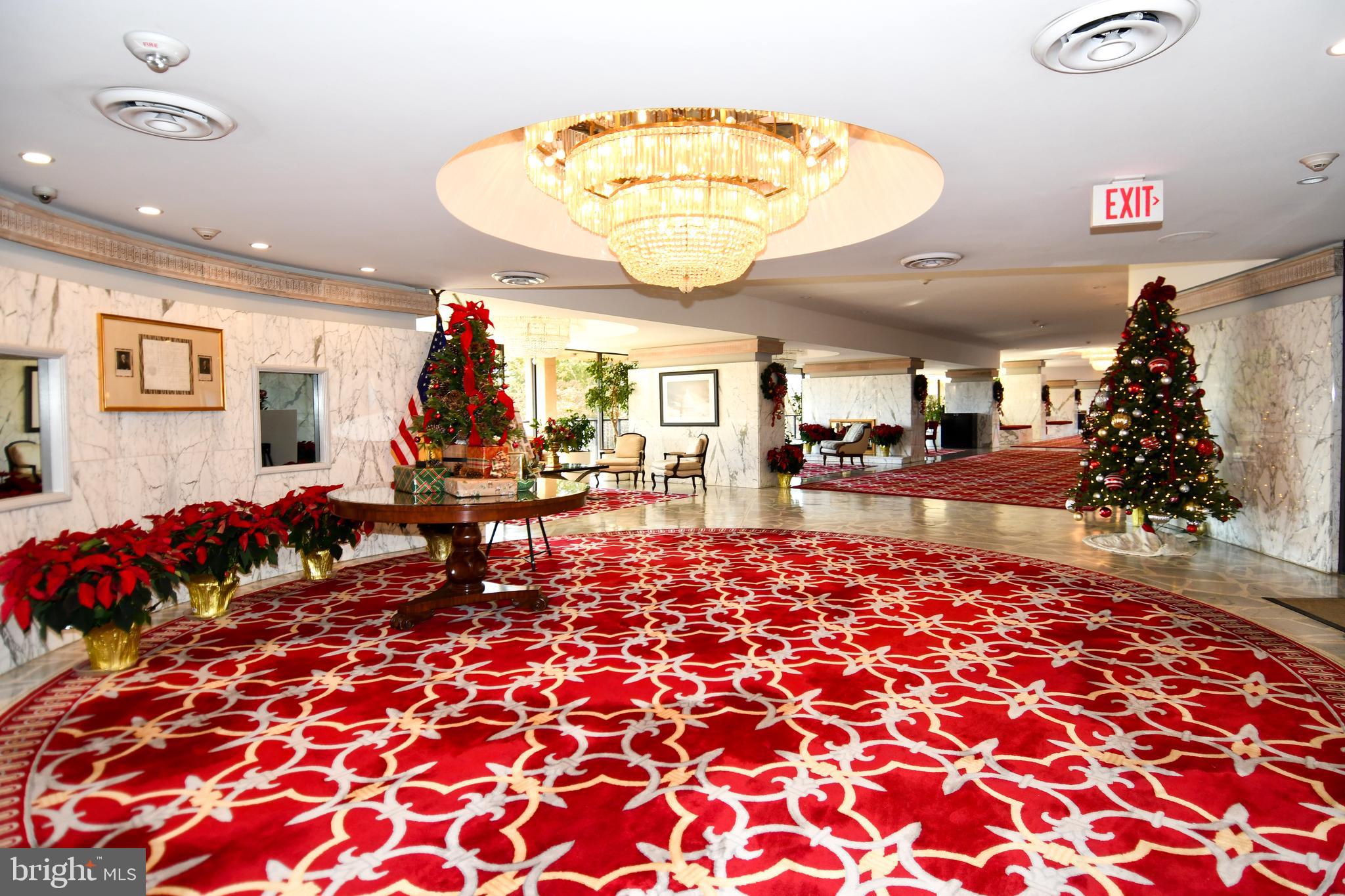 1101 South Arlington Ridge Road, Unit 316 Arlington, VA 22202 - Photo 61 of 75 Warm welcome to guest reception desk