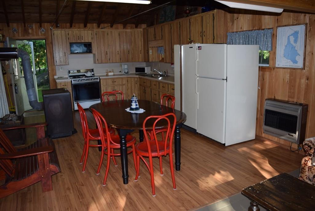 571 Phinney Farm Road Lincoln, ME 04457 - Photo 11 of 30 Dining area, two refrigerators to...
