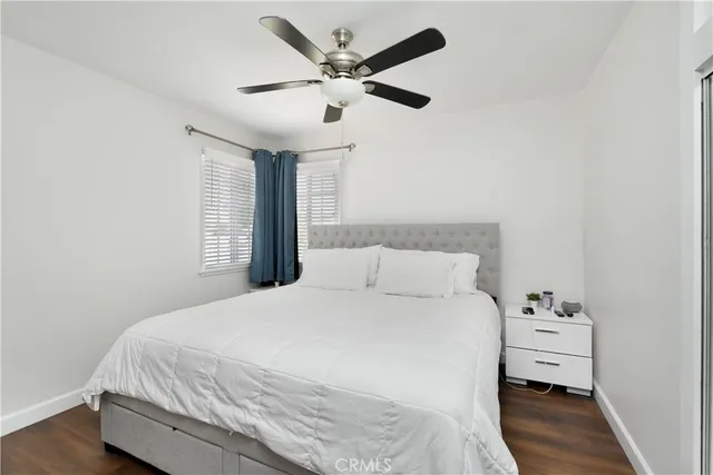 a large white bed in a white room