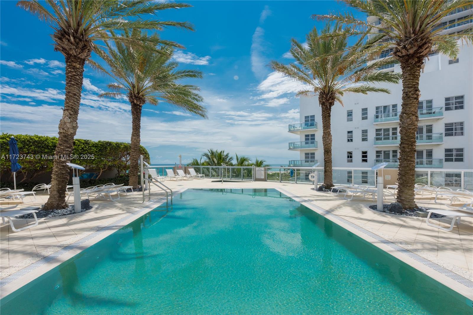 3801 Collins Avenue, Unit TH4 Miami Beach, FL 33140 - Photo 13 of 19 a view of a patio with a fountain