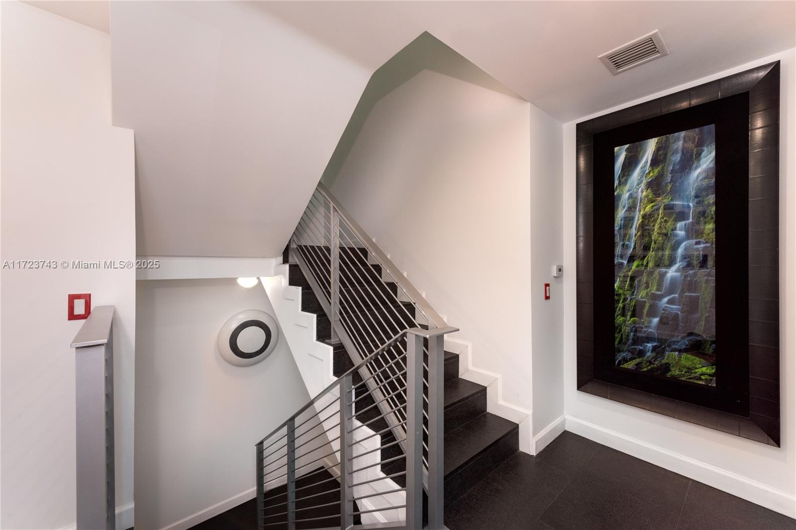 3801 Collins Avenue, Unit TH4 Miami Beach, FL 33140 - Photo 8 of 19 a view of entryway and hall with a door